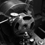 Black and white workshop photo indicating work in 4 jaw chuck