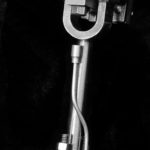 Black and white workshop photo Model engine connecting rod