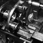 Black and white workshop photo watchmakers lathe