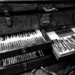 Black and white workshop photo wood tool box with burrs